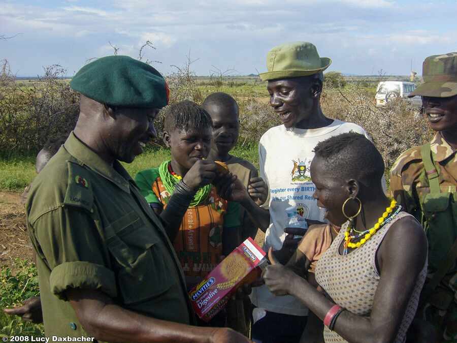 A CIMIC officer engaging community members during outreach in Karamoja.