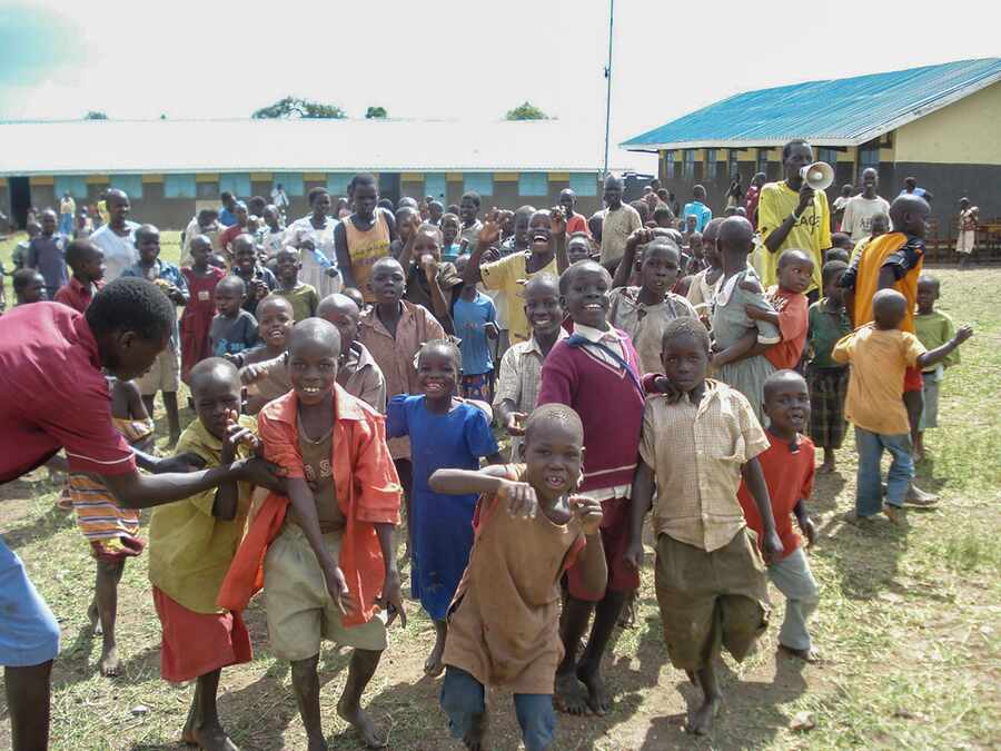 Children gathering during a community outreach activity.