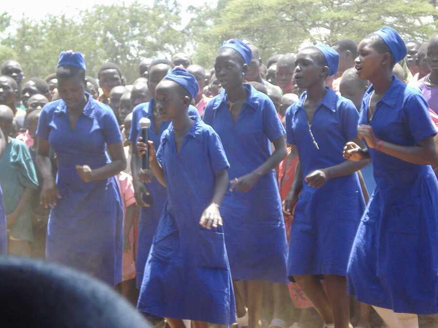 Girls taking part in a coordinated school performance.