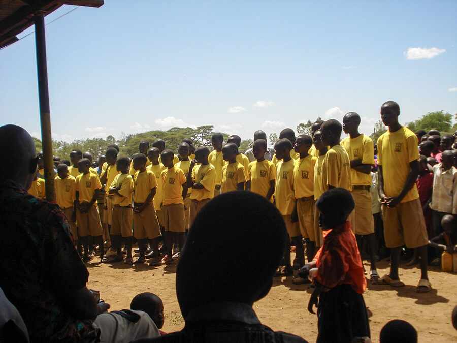 Young women participating in a school and community presentation.