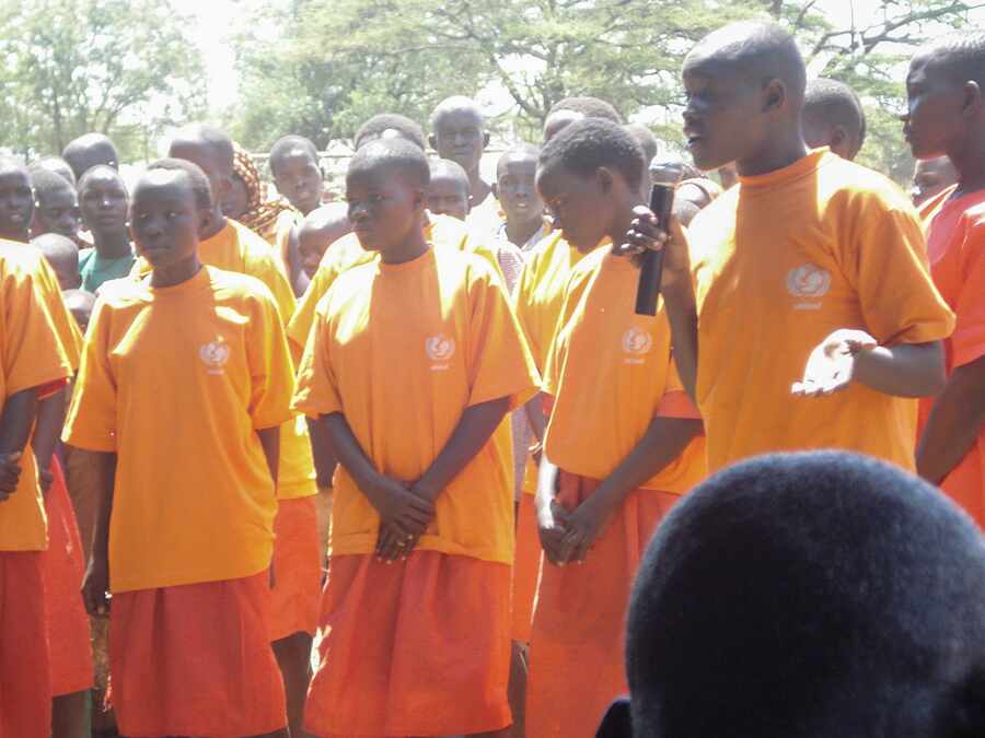 Learners participating actively in a community programme.