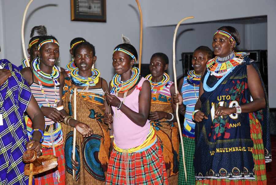 Karimojong women presenting cultural expression during a community event.