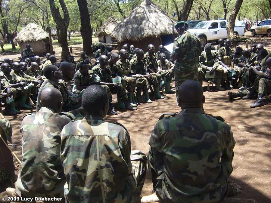 A UPDF commanding officer facilitating training for security personnel.