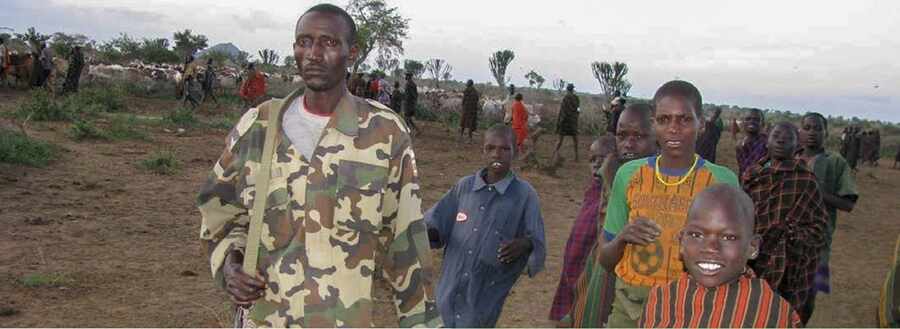 Security personnel engaging families during a CIMIC field activity.