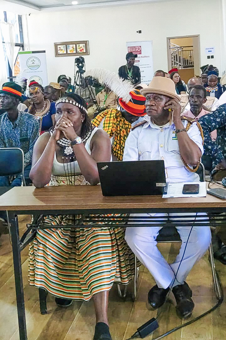 Hon. David Bwangamoe Pulkol listening during the Karamoja Cultural Festival dialogue