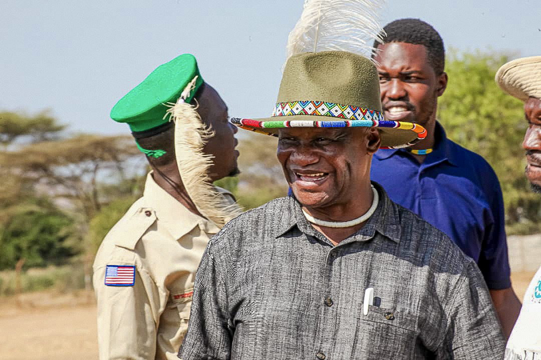 Hon. David Bwangamoe Pulkol engaging participants during the 11th Karamoja Cultural Festival