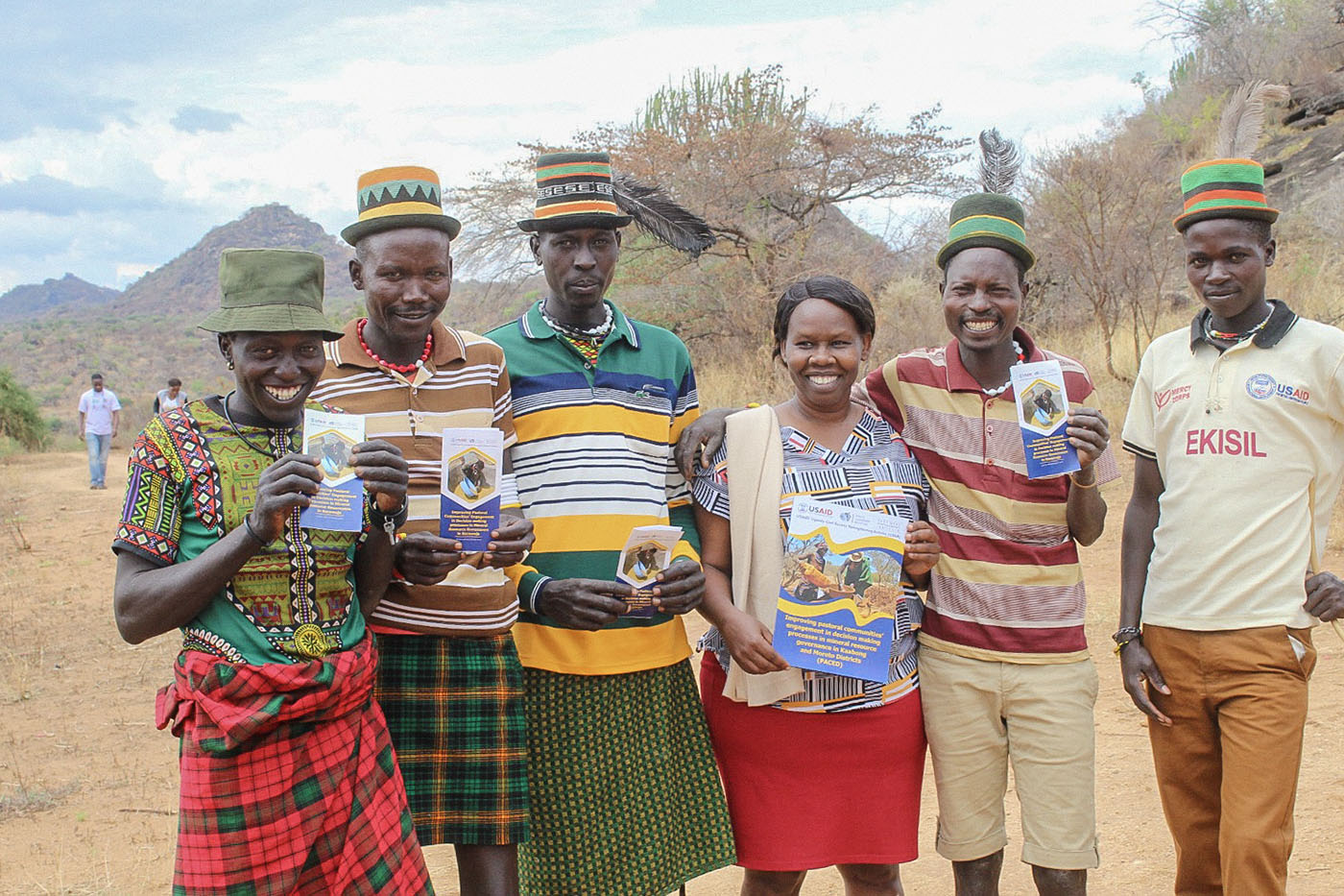 PACED participants displaying community engagement and land-governance information materials